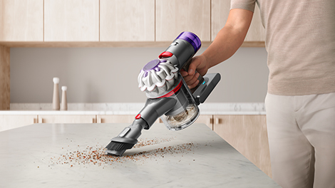 The V8-2023 is easily lifted up as a hand-held to clean-up the crumbs from a table-top.